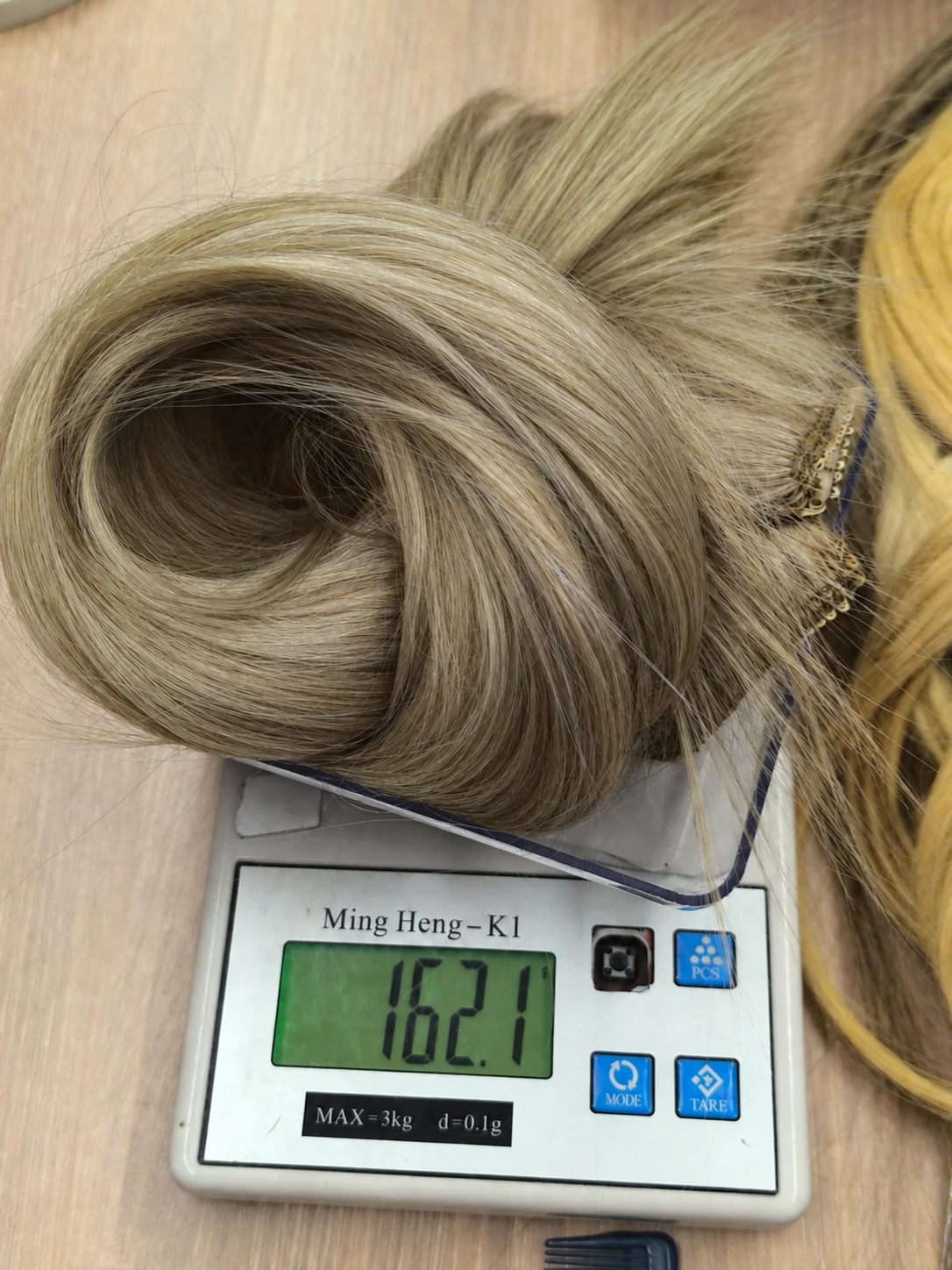 Weighing a hair sample during inspection.