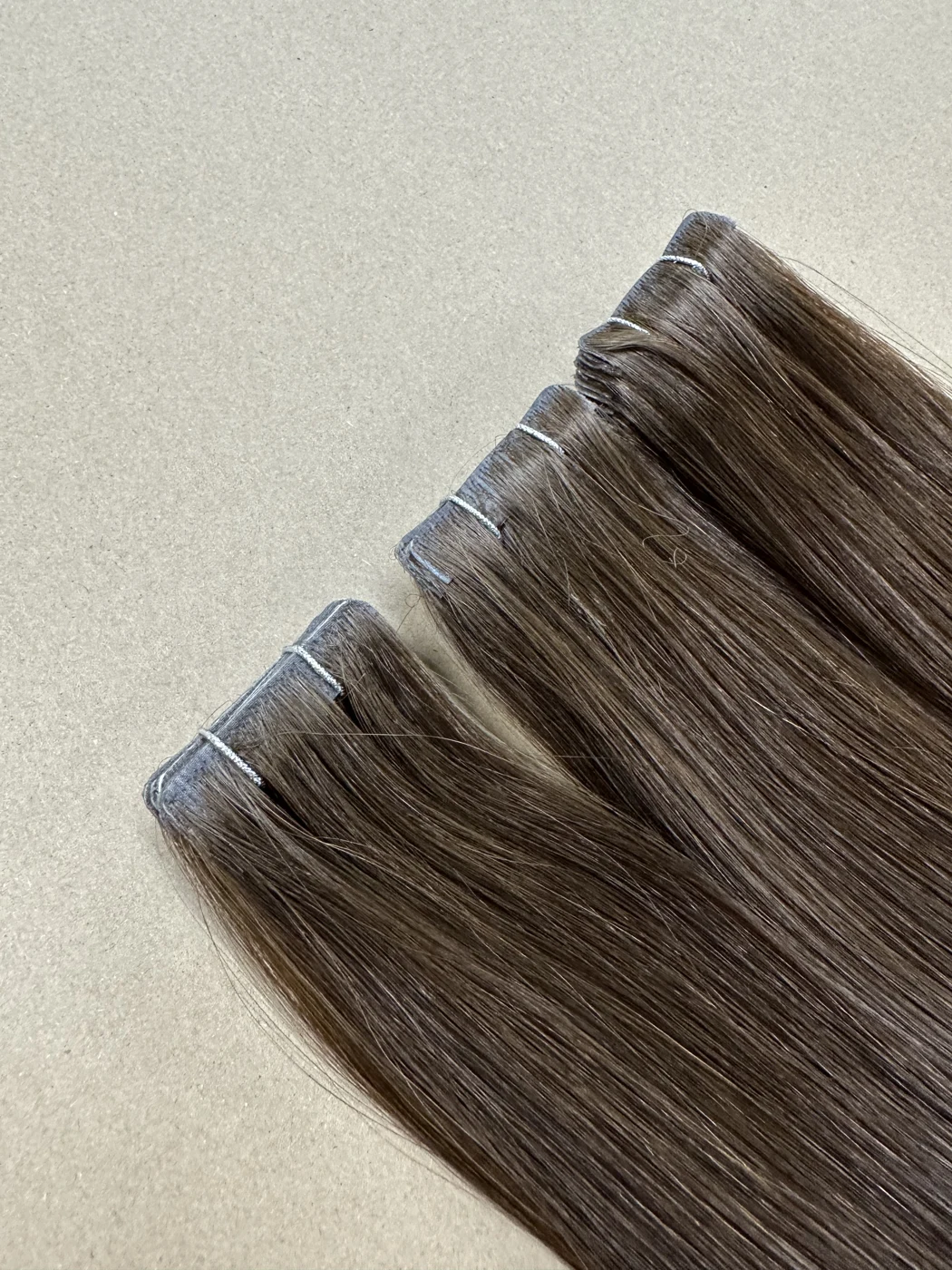 Brown seamless tape-in attachment detail