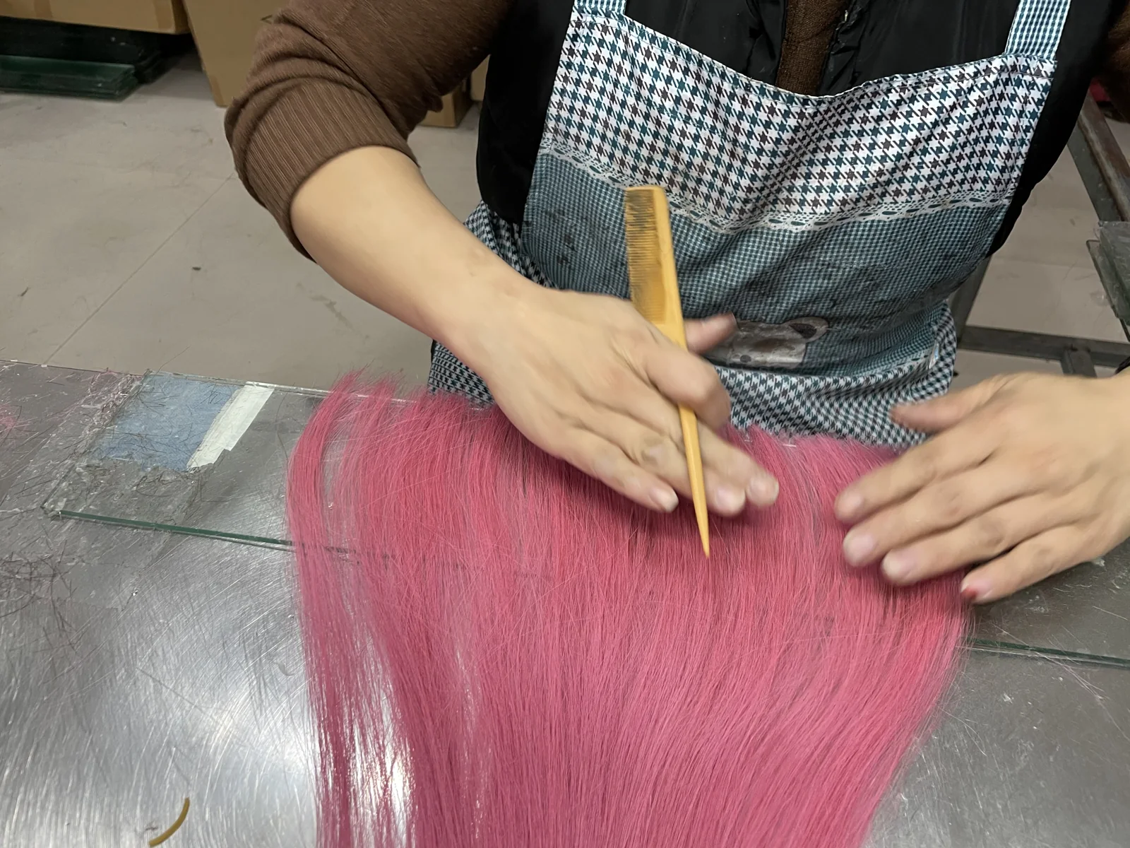 Careful handling and combing of hair during production
