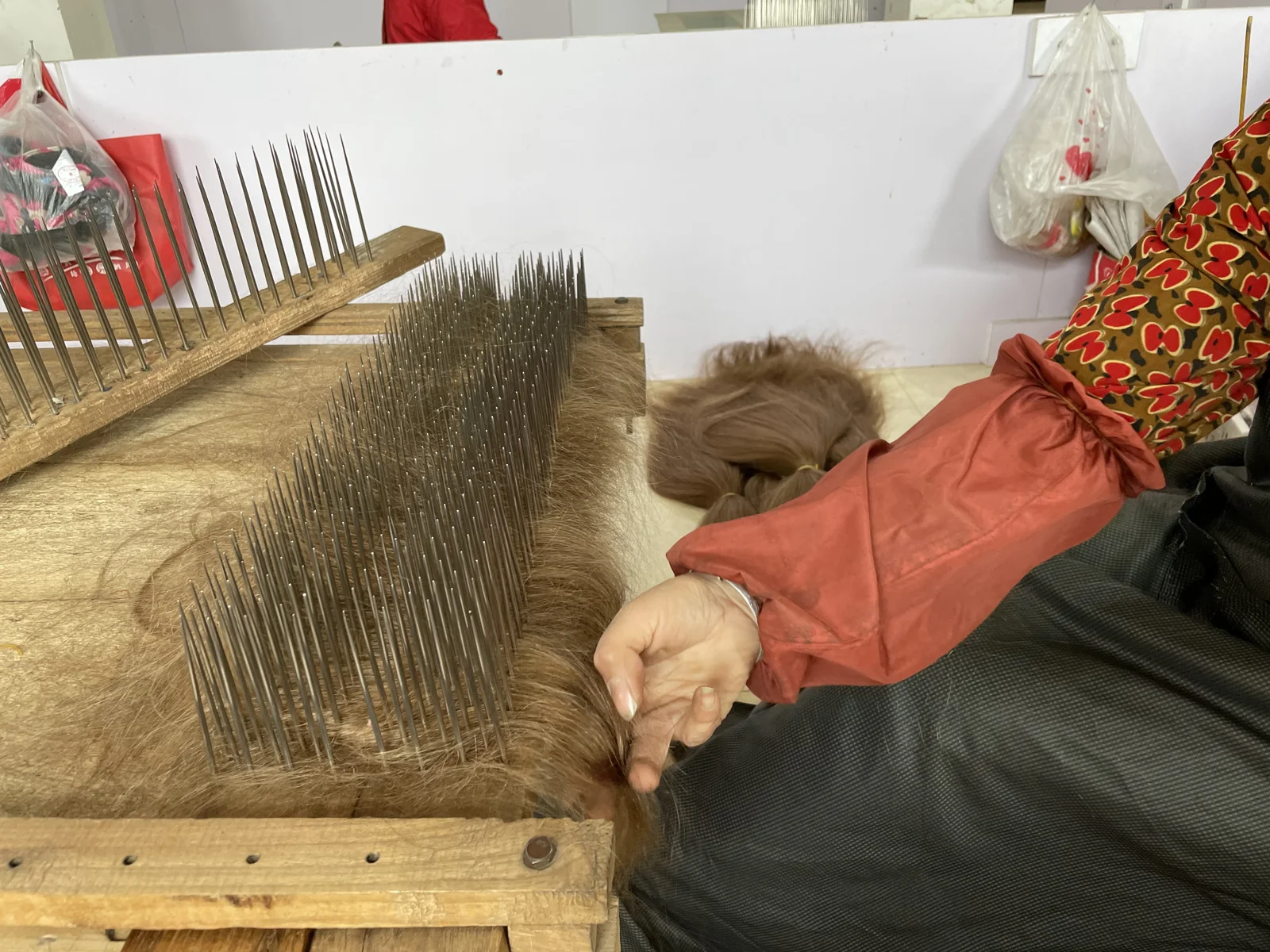 Hair preparation using a metal-pin combing board